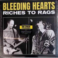 Riches To Rags - RED VINYL